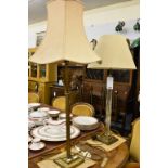 A base metal column table lamp with pineapple top together with a glass column table lamp, both on