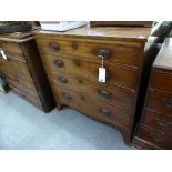 An early 19th century inlaid mahogany straight fronted chest of drawers,the boxwood strung top