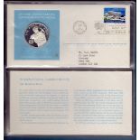 COINS : 1973 and 74 United Nations Sterling Silver medallion covers in special albums.