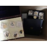 COINS : Various presentation boxes and folders including Crowns etc, some gold plated copper coins,