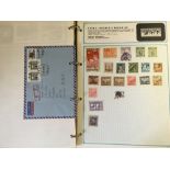 STAMPS : World accumulation in two albums plus a 1987 GB year book. Plus an album of New Zealand.