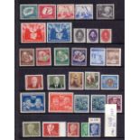 EAST GERMANY STAMPS Selection of U/M sets & singles on three stock pages with useful early issues
