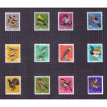 STAMPS : BIRDS collection in Burgundy Frank Godden album with black pages,