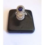 Natural Sapphire and Diamond Moi at Toi 1920s Platinum Mounted Ring Centre Diamond 0.57 Carats