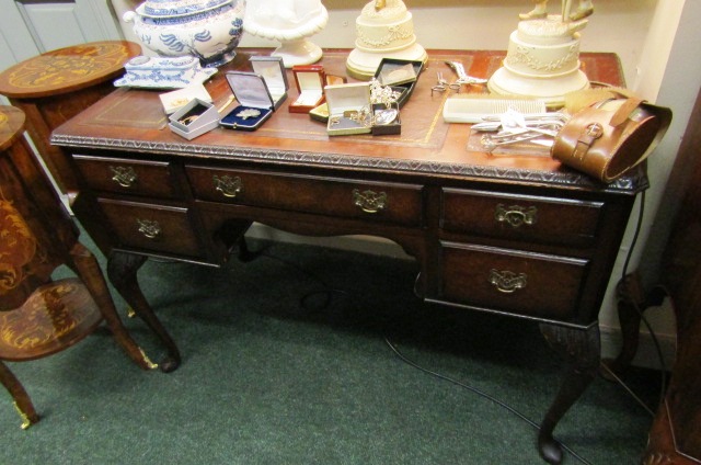 Antique Figured Mahogany Five Drawer Writing Desk on Shaped Supports with Gilt Tooled Leather