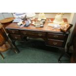 Antique Figured Mahogany Five Drawer Writing Desk on Shaped Supports with Gilt Tooled Leather