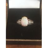 Opal Centre Stone and Diamond Decorated 9 Carat Gold Mounted Ladies Ring