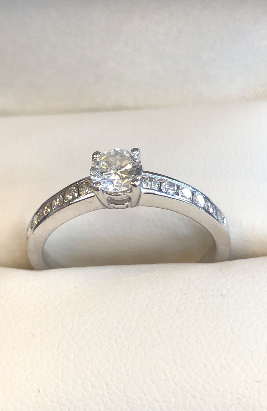 Solitaire Round Brilliant Cut Diamond Ring Set on Four Claw Setting with Further Diamond Decorated