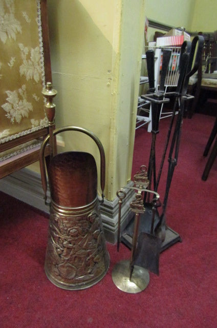 Edwardian Embossed Brass Coal Scuttle Good Condition with Brass Naval Motif Fire Irons Resting on