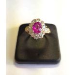 Natural Burmese Ruby Centre Stone Ring with Further Diamond Decoration Clustered Around and