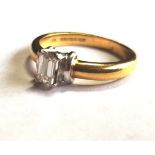 Emerald Cut Solitaire Diamond Ring Set on 18 Carat Yellow Gold