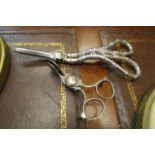 Solid Silver Candle Snuff Victorian and Another Silver Plated Grape Scissors Two Items in Lot