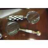Two Magnifying Glasses One with Ivory and Ebony Handled The Other Mother of Pearl and Brass Mounted