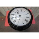 Industrial Roman Numeral Wall Clock of Circular Form 19 Inches Wide