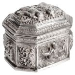 A SMALL BURMESE SILVER BOX, LATE 19TH / EARLY 20TH CENTURY of elongated octagonal form, the lid