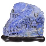 ‡ A CHINESE LAPIS LAZULI MOUNTAIN, 19TH CENTURY deeply carved on the front with a sage and two