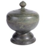 A KHMER BRONZE RELIQUARY, CAMBODIA, CIRCA 12TH CENTURY the bowl on flared rim foot, the domed lid