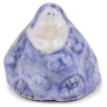 BLUE AND WHITE PORCELAIN SHUNGA NETSUKE OF OKAME, CIRCA 1870 masturbating discreetly, unsigned 3cm