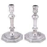 A PAIR OF ITALIAN SILVER CANDLESTICKS, MAKER'S MARK ZP, VENICE, CIRCA 1725 on cast moulded bases,