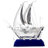 A MODEL OF A DHOW, PERSIAN GULF, MODERN the twin masted vessel with prominent prow, stamped '925',