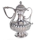 A MUGHAL SILVER SCENT BOTTLE, NORTHERN INDIA, 18TH CENTURY with ribbed bulbous body, standing on