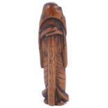 WOOD NETSUKE OF TEKKAI SENNIN, CIRCA 1800 very simply carved, leaning on his staff, unsigned 9.3cm