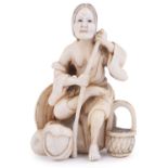 ˜IVORY NETSUKE OF THE POETESS ONO NO KOMACHI, CIRCA 1820 the fabled beauty shown as an old woman