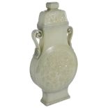 A CHINESE MUGHAL STYLE CELADON JADE 'LOTUS MEDALLION' FLASK AND COVER the flattened circular body