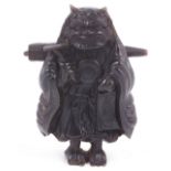 MOULDED CASEIN NETSUKE OF ONI NO NEMBUTSU, THE PENITENT DEMON, CIRCA 1870 unsigned 5.3cm high