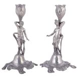 A PAIR OF GERMAN JUGENDSTIL FIGURAL CANDLESTICKS, WUERTTEMBERGISCHE METALLWARENFABRIK (WMF),