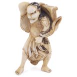 ˜IVORY NETSUKE OF TADANOBU HURLING A GO BOARD, CIRCA 1870 unsigned 4.6cm high Provenance: The