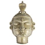 A SMALL BRASS HEAD OF SIVA, WESTERN DECCAN, INDIA, CIRCA 18TH CENTURY from a lingam, the