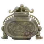 A CHINESE ARCHAISTIC JADE 'CHILONG' JAR AND COVER