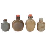 A STUDY GROUP OF FOUR CHINESE SNUFF BOTTLES comprising: a jade bottle and jade stopper; a large