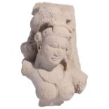 A BUFF SANDSTONE FRAGMENTARY FEMALE BUST, RAJASTHAN OR MADHYA PRADESH, CENTRAL INDIA, 10TH/11TH