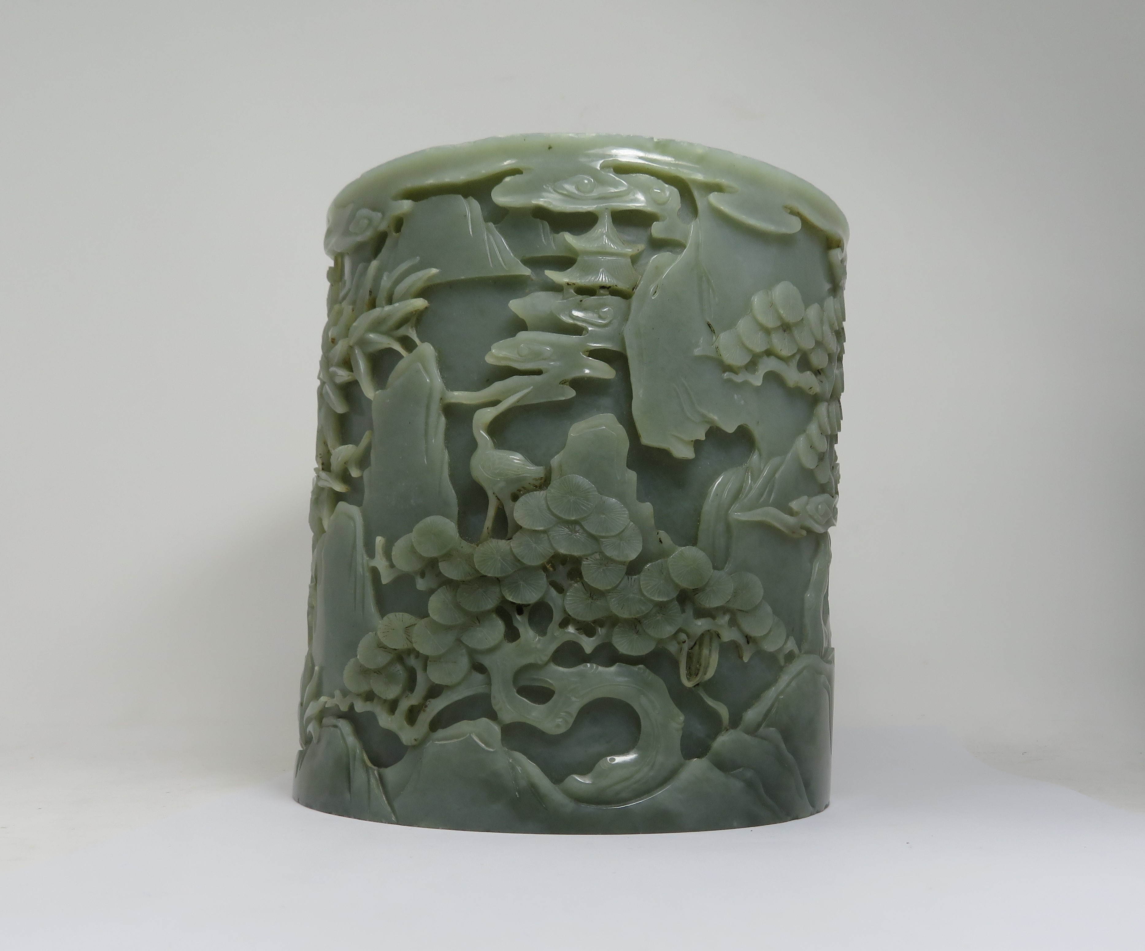 A CHINESE CELADON JADE 'IMMORTALS' BRUSHPOT - Image 2 of 4