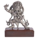 A SILVER FIGURE OF VAJRAPANI, TIBET, CIRCA 18TH CENTURY