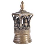 A SMALL JAIN BRASS SHRINE, WESTERN INDIA, CIRCA 17TH CENTURY in the form of a four-sided canopied