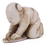 ˜LIGHTLY STAINED IVORY NETSUKE OF A BOY CRUSHING A BUTTERFLY WITH A FAN, CIRCA 1870 signed: