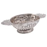 A DUTCH SILVER BRANDY BOWL, MAKER'S MARK INDISTINCT, SNEEK, EARLY 18TH CENTURY oval, on embossed