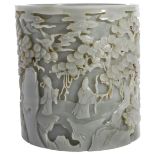 A CHINESE CELADON JADE 'IMMORTALS' BRUSHPOT