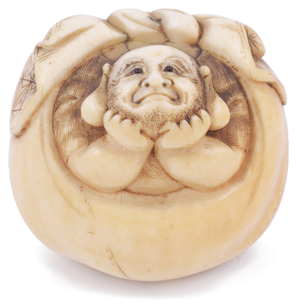 ˜LIGHTLY STAINED IVORY NETSUKE OF THE LUCKY GOD HOTEI IN HIS SACK, CIRCA 1870 looking upwards with a