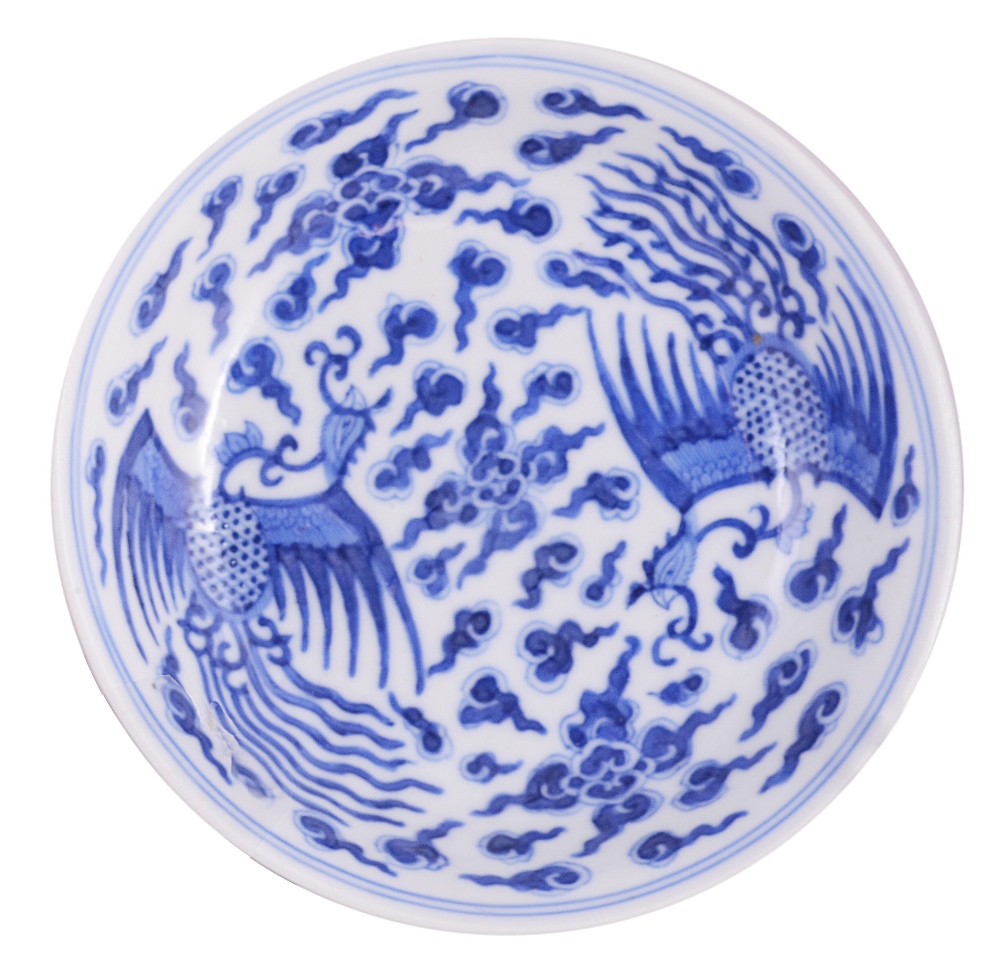 A CHINESE BLUE AND WHITE BOWL, GUANGXU MARK AND PERIOD (1875-1908) painted on the exterior with pine