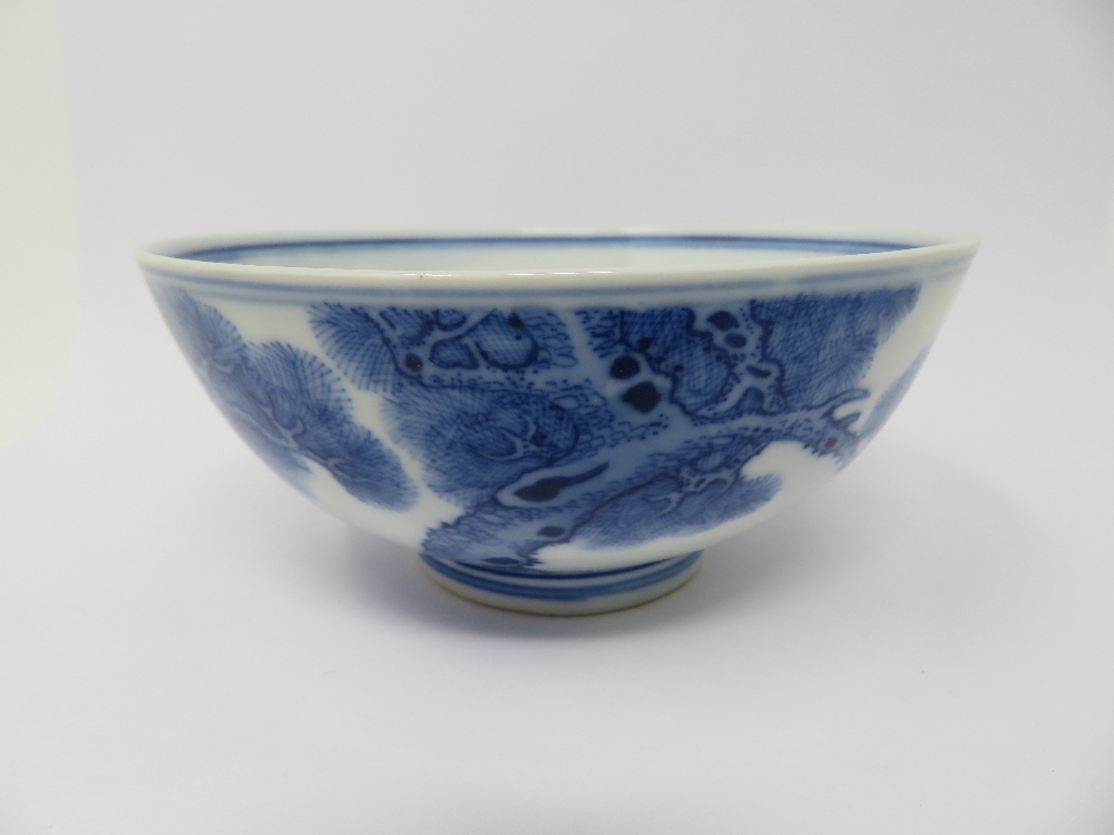 A CHINESE BLUE AND WHITE BOWL, GUANGXU MARK AND PERIOD (1875-1908) painted on the exterior with pine - Image 2 of 4