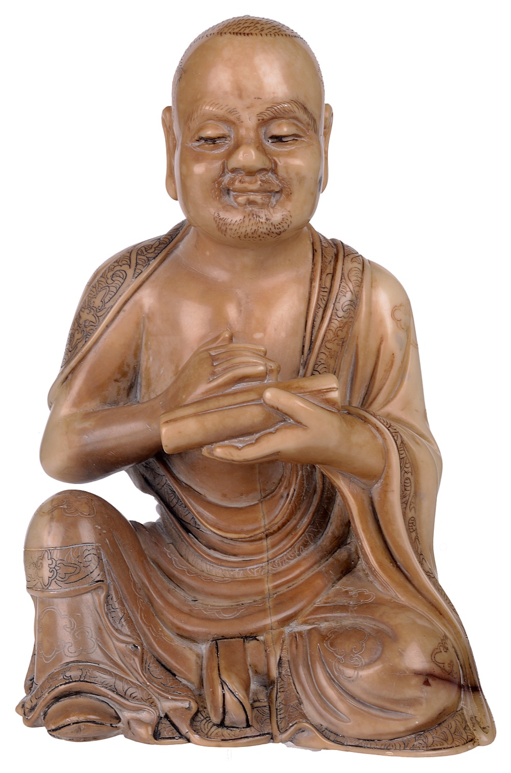 ‡ A CHINESE SOAPSTONE FIGURE OF A LUOHAN, 19TH CENTURY the beige soapstone figure carved seated