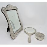 ˜A SILVER-MOUNTED FRAME, MAKER'S MARK RBB, LONDON, 1982 oblong, set with a bevelled looking glass,