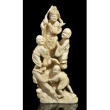 ˜A JAPANESE IVORY OKIMONO OF A MAN AND BOYS WITH BAMBOO LADDER, MEIJI PERIOD (1868-1912) carved with