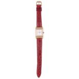 ˜JAEGER-LECOULTRE, REVERSO, REF.265.1.86: LADY'S EIGHTEEN CARAT GOLD, DIAMOND AND RUBY WRISTWATCH