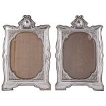 A MATCHED PAIR OF LARGE SILVER-MOUNTED PHOTOGRAPH FRAMES, BOTH BIRMINGHAM, ONE DAVIS, MOSS & CO.,