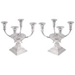 A PAIR OF SPANISH SILVER CANDELABRA VASES, POST 1934 with bands of fluting, stepped square bases (